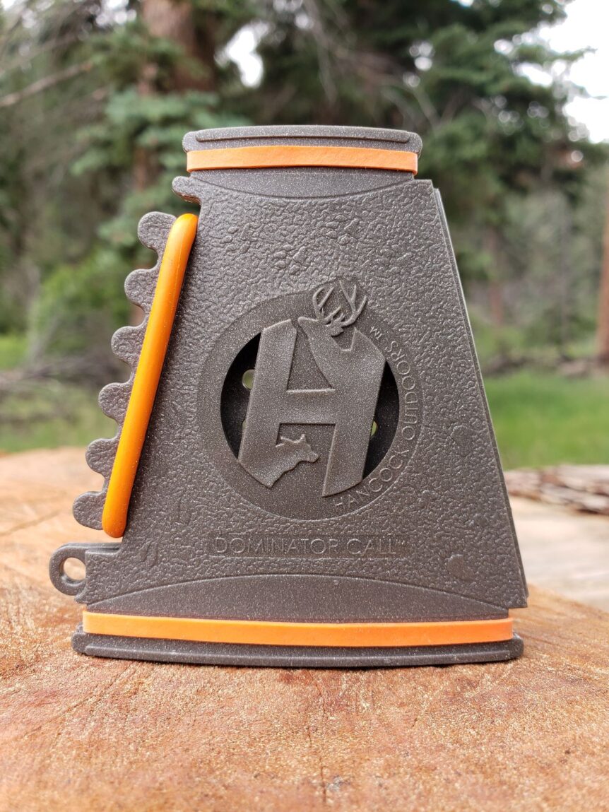 Triangular textured turkey call with orange accents